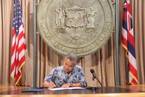 Gov. Ige signs HB2350 and SB2878 into law, showing his commitment to Hawai‘i’s foster youth and resource caregivers. 